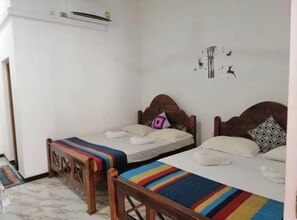 Camera doppia, 1 letto queen, non fumatori, vista giardino | Aria condizionata