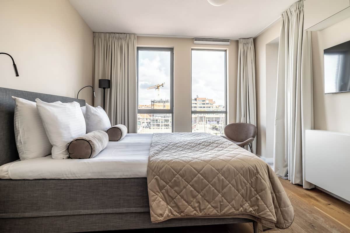 Apartemen, 2 kamar tidur (Nr. 38C) | Brankas, kedap suara, setrika/meja setrika, dan Wi-Fi gratis