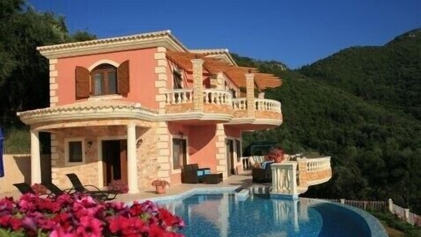 A two-story house with a swimming pool, surrounded by greenery and hills. - Special Offer for August  (Corfu)