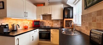 A lovely quiet new flat 50 yards from the beach in the centre, parking included.