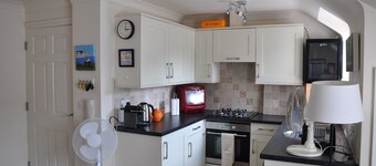 A lovely quiet new flat 50 yards from the beach in the centre, parking included.