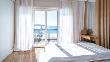 Apartamento família, 3 quartos, vista para o mar | Roupas de cama antialérgicas, cofres nos quartos