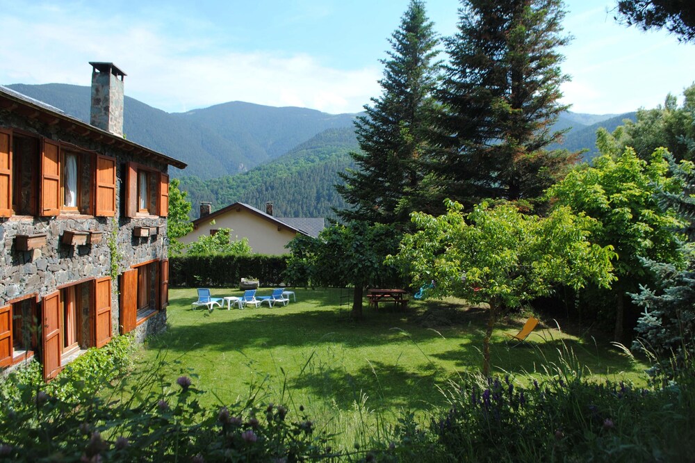 Ground floor of an isolated rustic house with garden