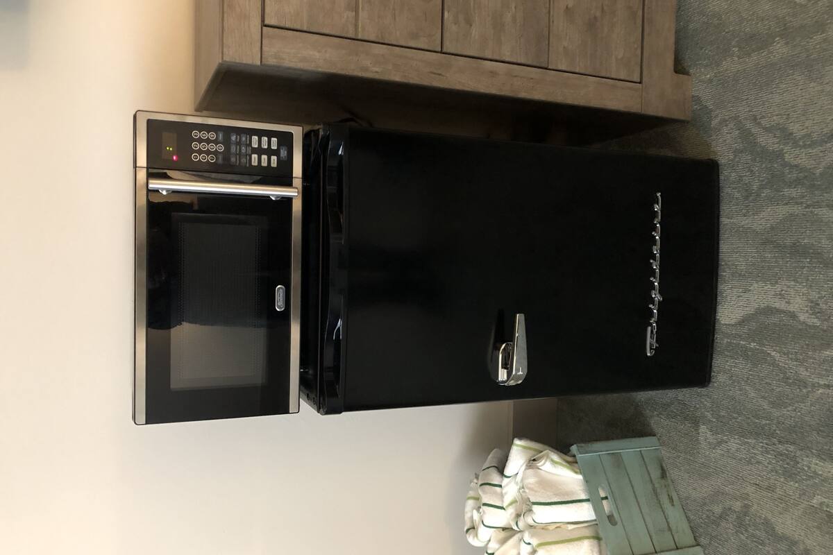 deluxe quadruple room, 1 king bed with sofa bed, non smoking | minibar