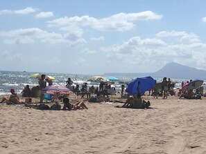 Beach nearby, sun loungers