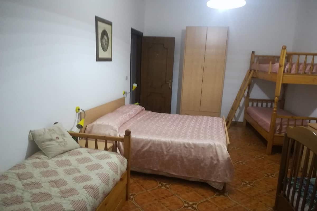 Family Room, Balcony, Mountain View | Minibar, desk, blackout drapes, rollaway beds