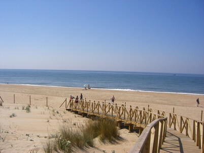 Luxury villa with private pool overlooking golf course, close to beach