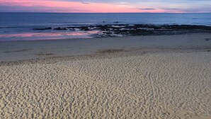 A beach with a rocky shoreline and a clear sky. - 3 bed Villa with Private Pool and Gardens- sleeps 6/8. 5min stroll to village.  (Olhos'de agua)