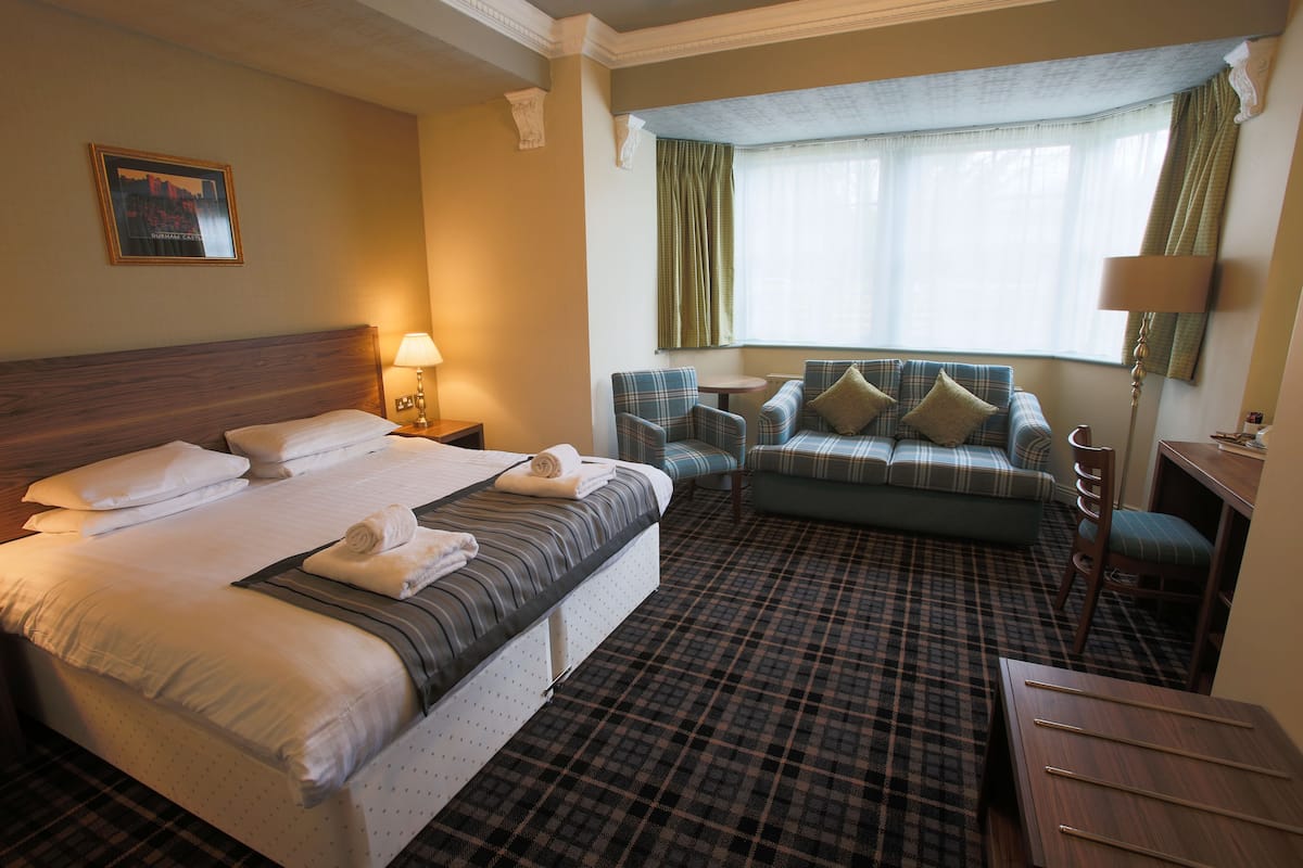 Standard Family Room | In-room safe, desk, iron/ironing board, bed sheets