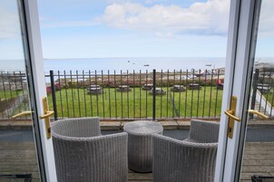 Double or Twin Room with Sea View and Balcony | In-room safe, desk, iron/ironing board, bed sheets