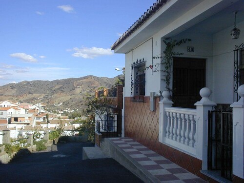 Stylish townhouse with superb views, elegant courtyard, pool and large terraces