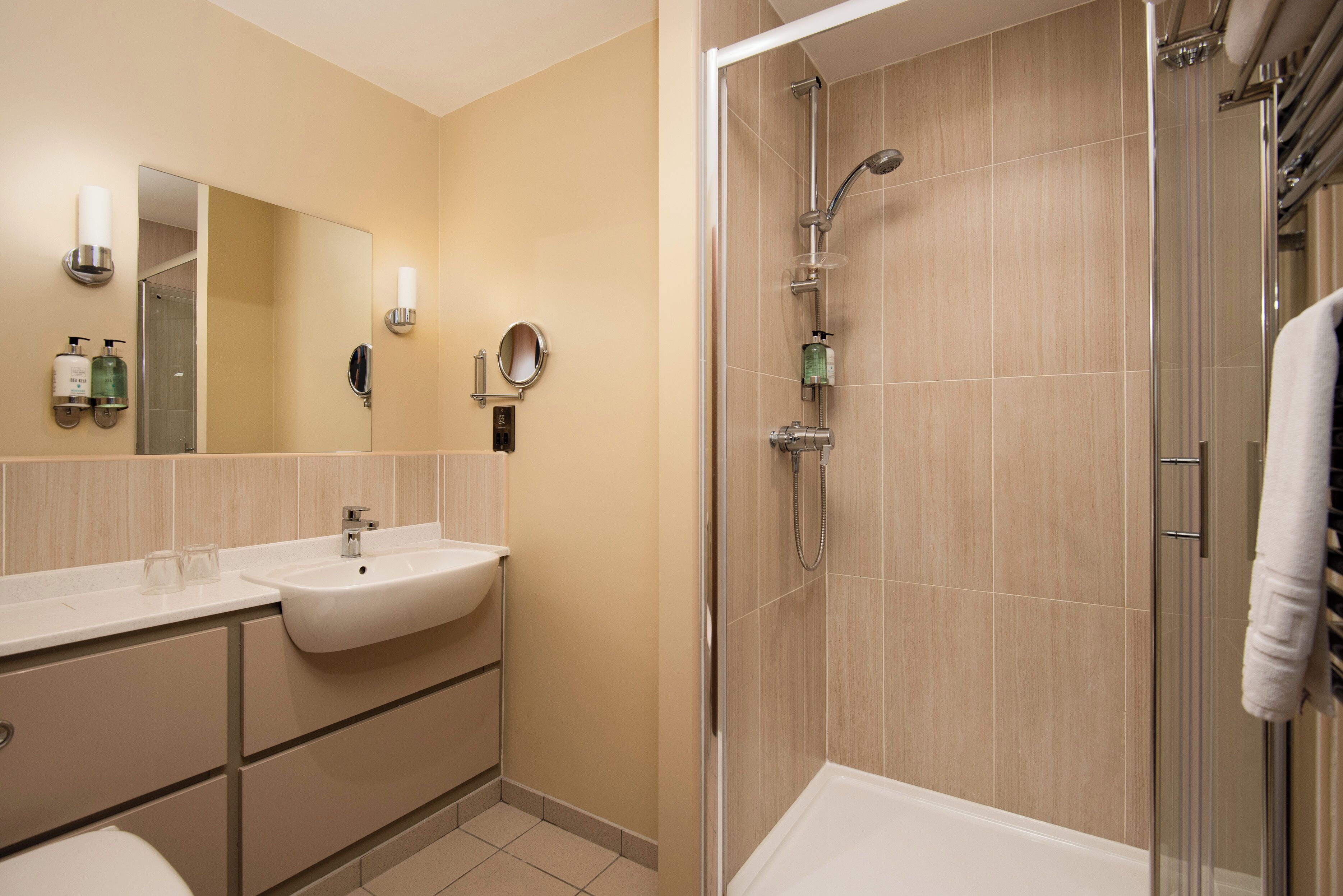 shower, free toiletries, hair dryer, towels