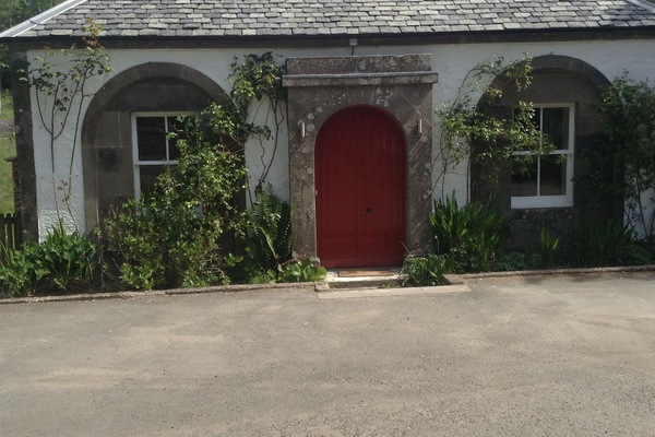 Front of lodge and parking area