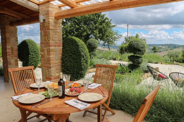 Dining alfresco at Casa Carina is wonderful with the amazing local food