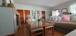 Smart TV, fireplace, DVD player, books