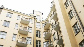 A multi-story residential building with balconies and windows. - 2ndhomes Bright Top Floor Studio in Fredrikinkatu (Helsinki)