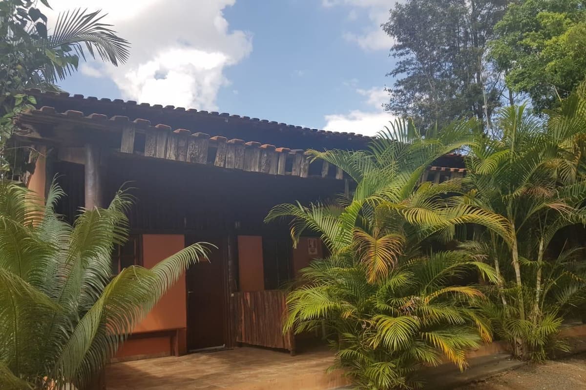 A building with a tiled roof and a wooden door.