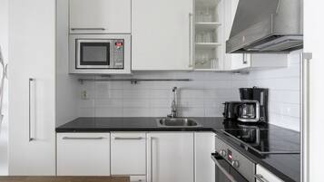 Deluxe-Apartment, 1 Doppelbett und Schlafsofa, Nichtraucher, Stadtblick | Wohnbereich