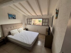 1 bedroom, iron/ironing board, travel crib