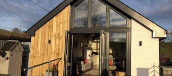 Selvhusholdning som ligger på landsbygda nær Carmarthenshire