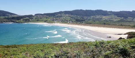 Una spiaggia nelle vicinanze, teli da spiaggia