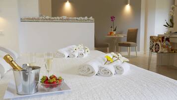 Luxury Quadruple Room | Minibar, in-room safe, individually decorated, individually furnished