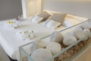 Luxury Quadruple Room | Minibar, in-room safe, individually decorated, individually furnished