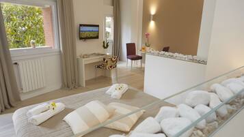 Luxury Quadruple Room | Minibar, in-room safe, individually decorated, individually furnished