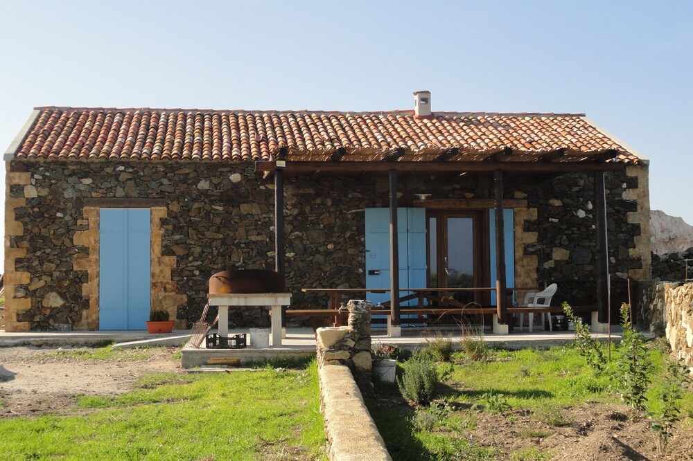 Isolated traditional sheepfold with pool overlooking the countryside. Sea at 500