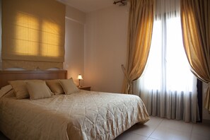 2 dormitorios, tabla de planchar con plancha, wifi y ropa de cama