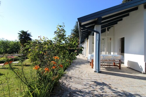 Lovely holiday home at Lake Orta with private garden and pool