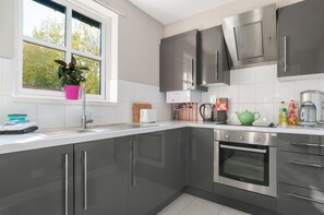 City House | Private kitchen | Full-sized fridge, microwave, oven, stovetop - The Fettes Residence (Edinburgh)