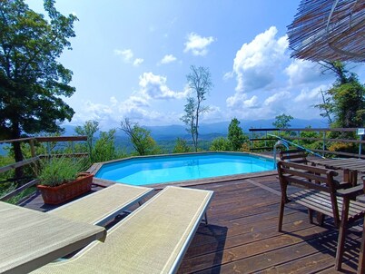 Rustico farmhouse with garden and swimming pool in a hilly area