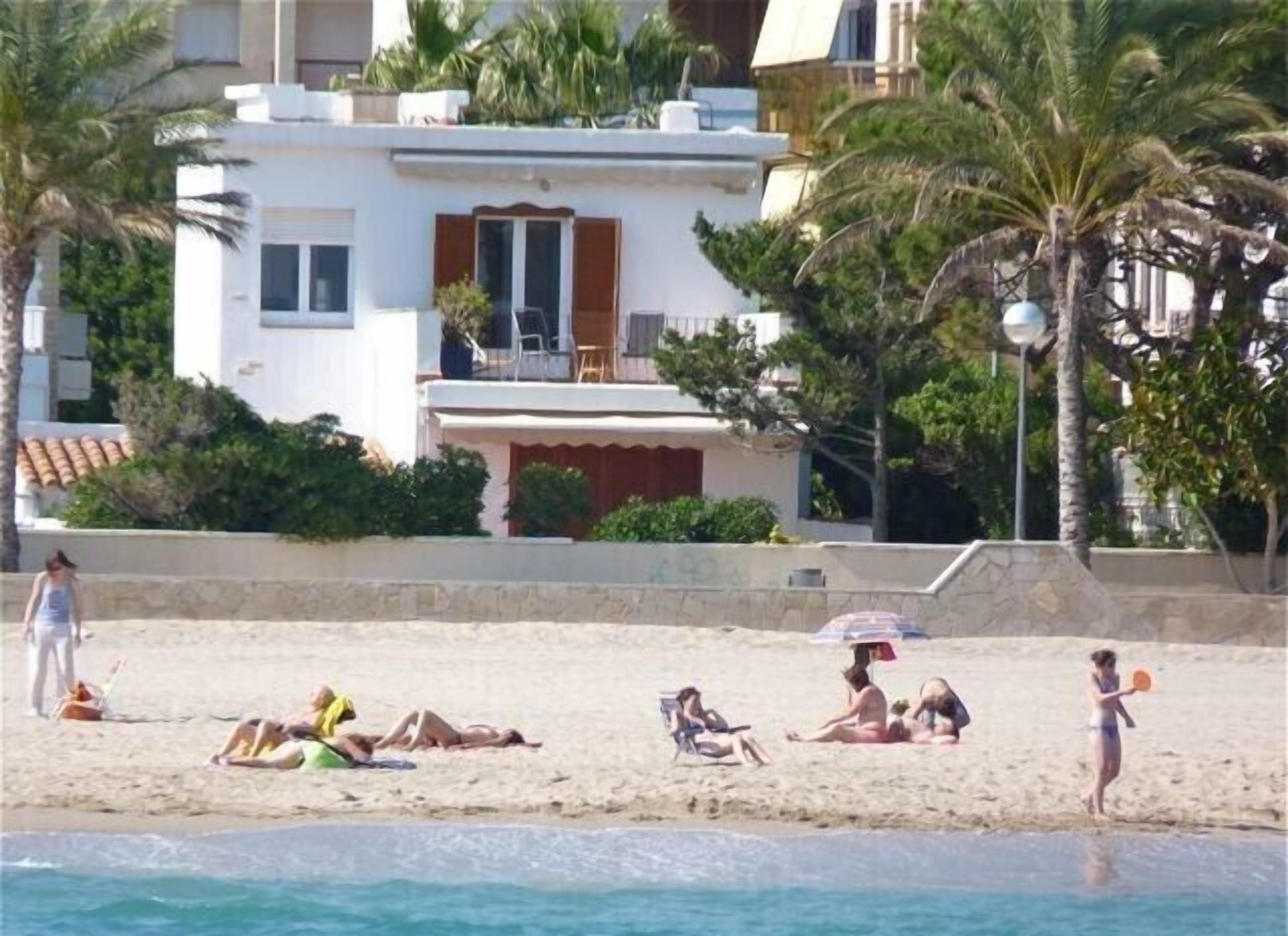 On the beach, sun loungers