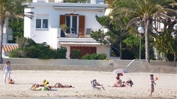On the beach, sun loungers