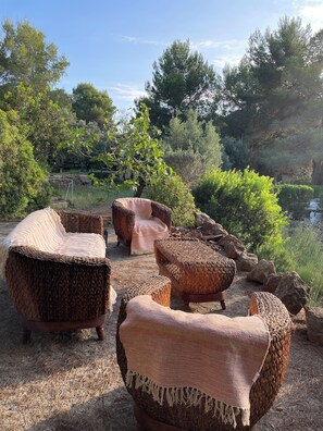 Wicker furniture with cushions in an outdoor setting. - Unique traditional Spanish finca/villa (Pedreguer)