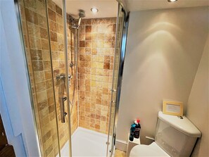 Bathtub, hair dryer, towels