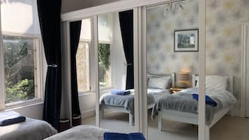 3 bedrooms, desk, iron/ironing board, travel cot