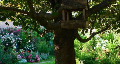 Elegant rustic flower house with large garden