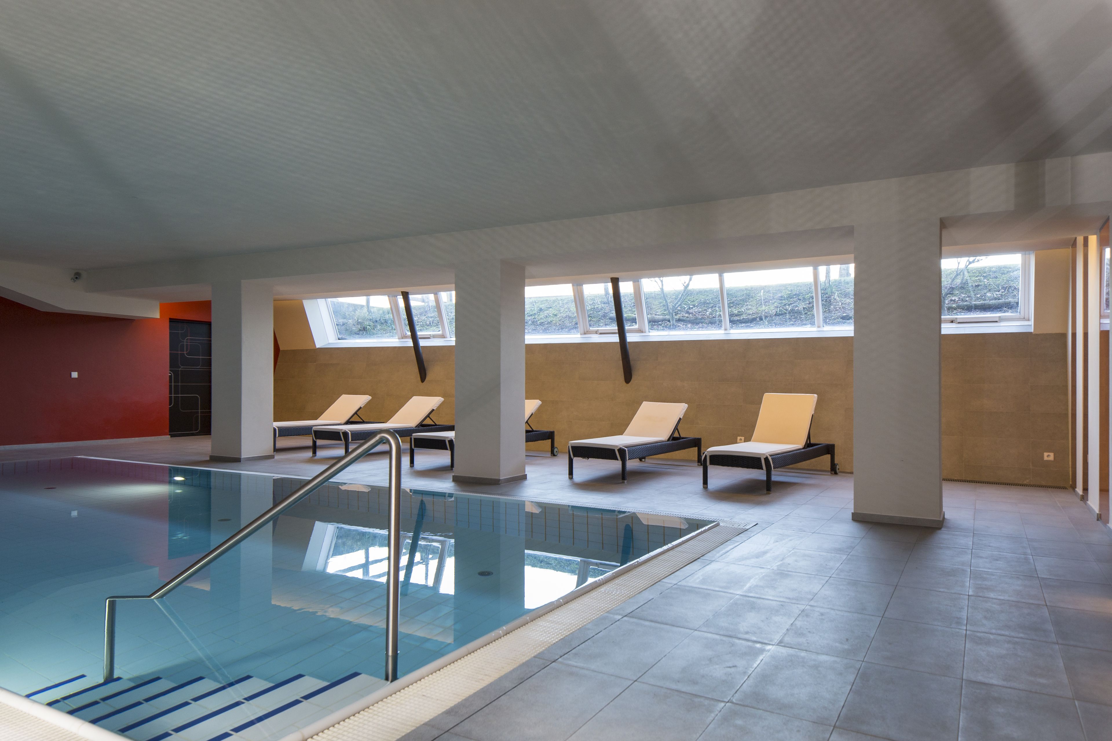 indoor pool, open 8:00 am to 8:00 pm, pool loungers