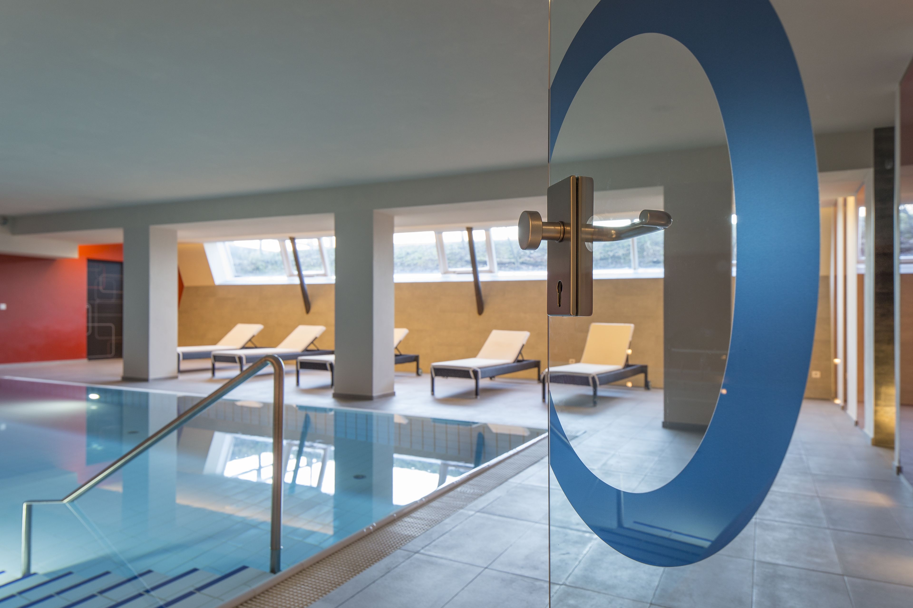 indoor pool, open 8:00 am to 8:00 pm, pool loungers