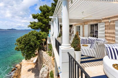 Extraordinary seafront villa with pool for up to 9 people