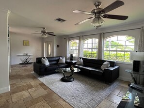 Smart TV, DVD player, foosball, books