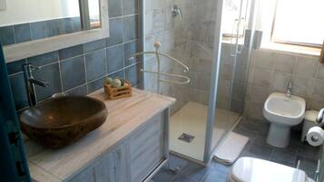 Shower, hair dryer, bidet, toilet paper