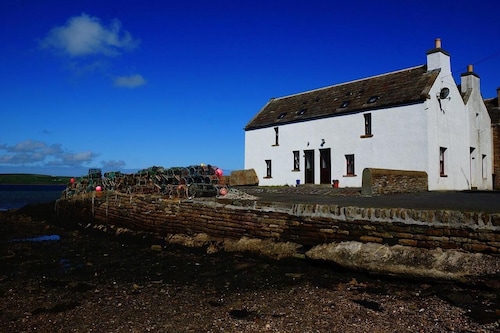 Unique Seaside Cottage in a picturesque village .
