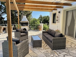 Terrace/patio - Spacious villa in extensive private grounds overlooking Ahai bay near Erimitis (Mpoikatika)