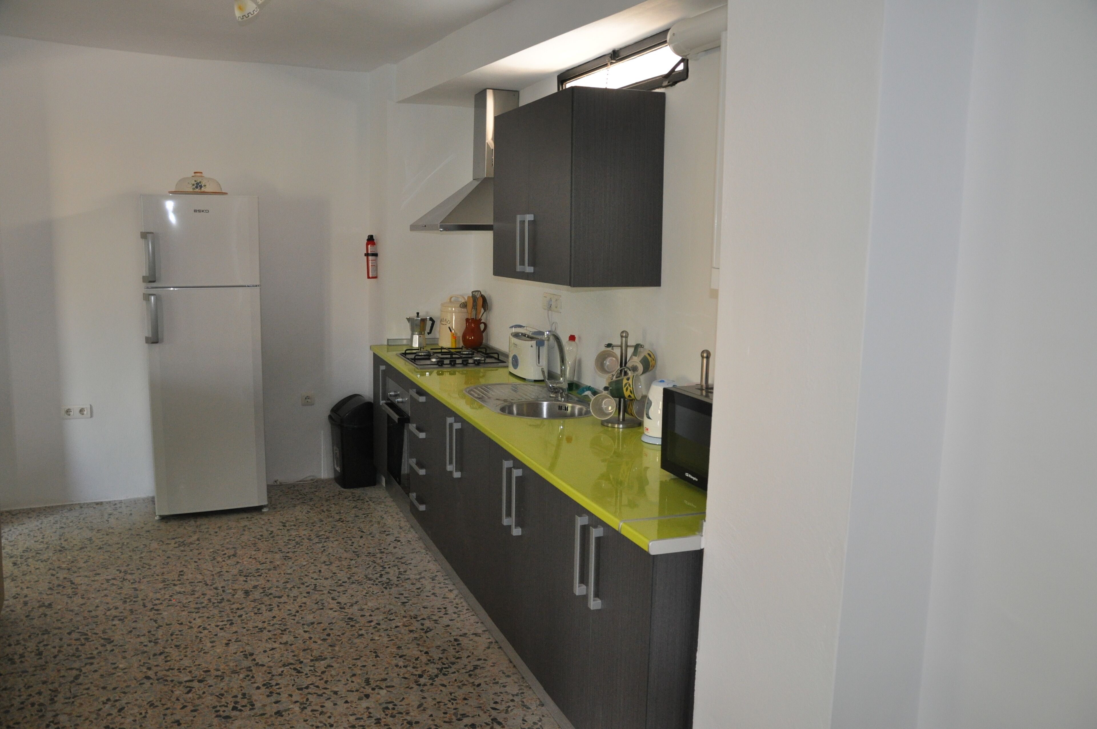 Recently renovated 2 bed townhouse with a large roof terrace in Orgiva town.