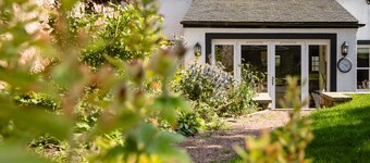Luxe cottage met tuin en parkeerplaats in het hart van het dorp.  8 personen.
