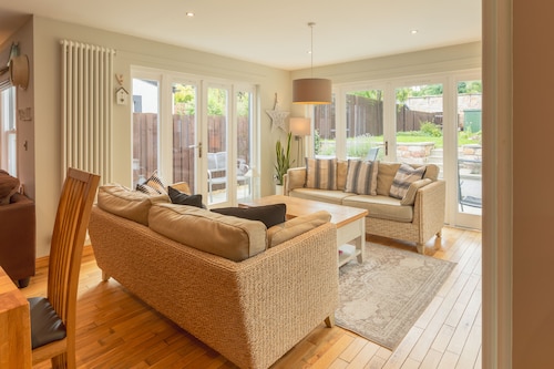 Luxury cottage with garden and parking in the heart of the village.  Sleeps 8.