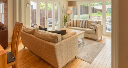 Luxury cottage with garden and parking in the heart of the village. Sleeps 8.